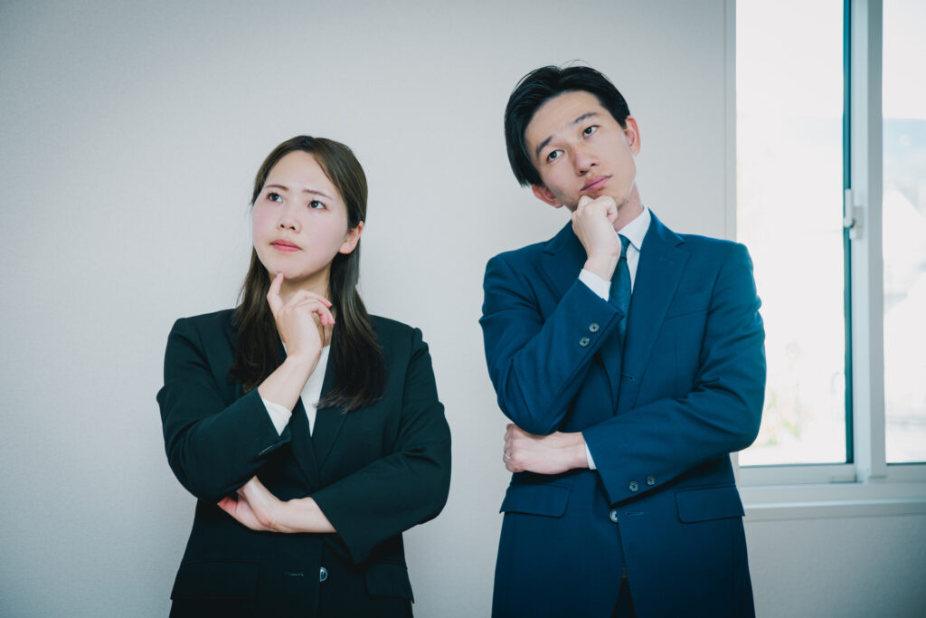 考える人